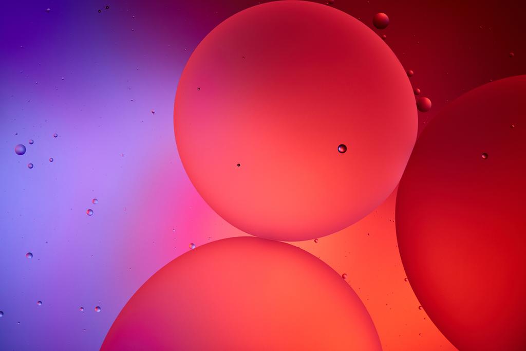 Bellissimo sfondo astratto da acqua mista e bolle d'olio in colore rosa e viola
 - Foto, immagini