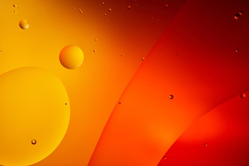 abstrakcyjny pomarańczowy i czerwony kolor tła z mieszanej wody i oleju  - Zdjęcie, obraz