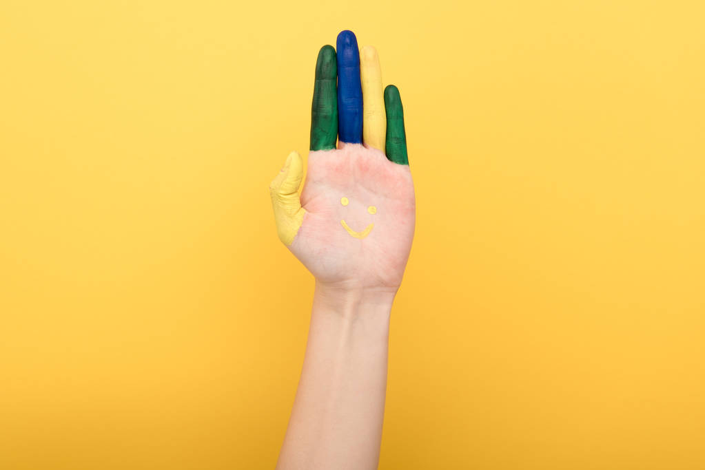 cropped view of woman showing colorful fingers isolated on yellow - Photo, Image