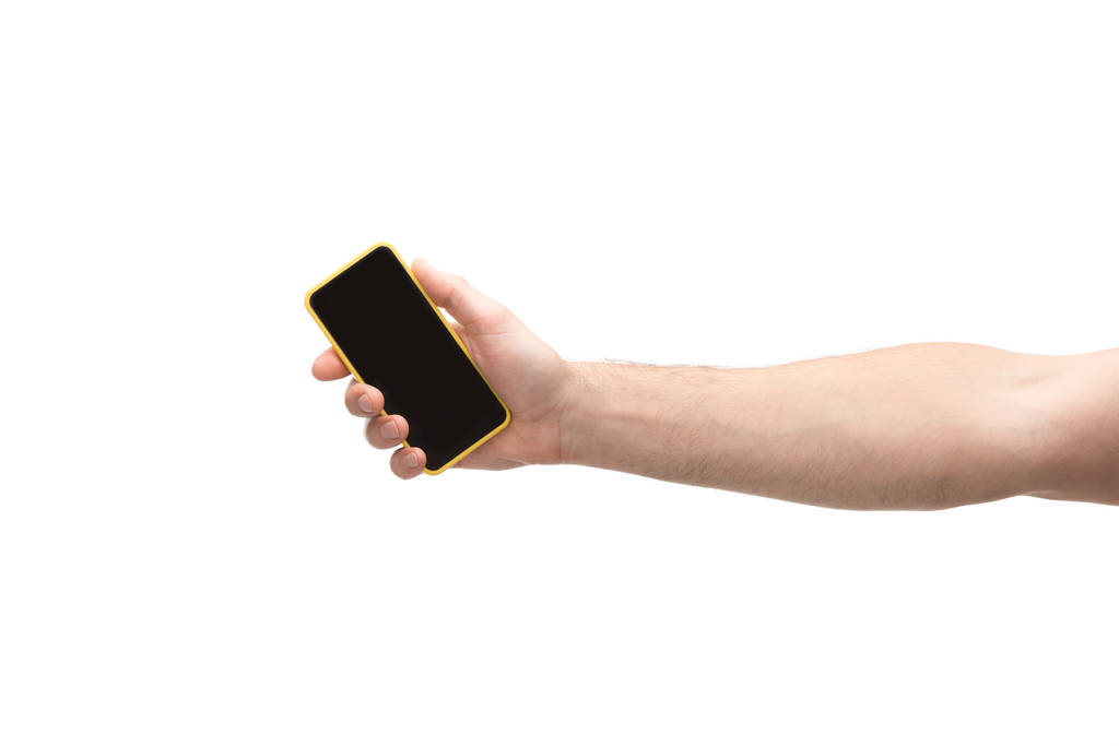 обрізаний вид людини, що тримає смартфон ізольовано на білому
 - Фото, зображення