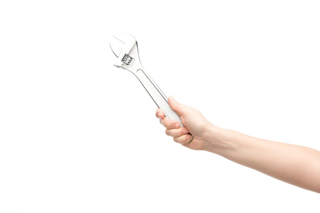 cropped view of woman holding spanner isolated on white - Photo, Image