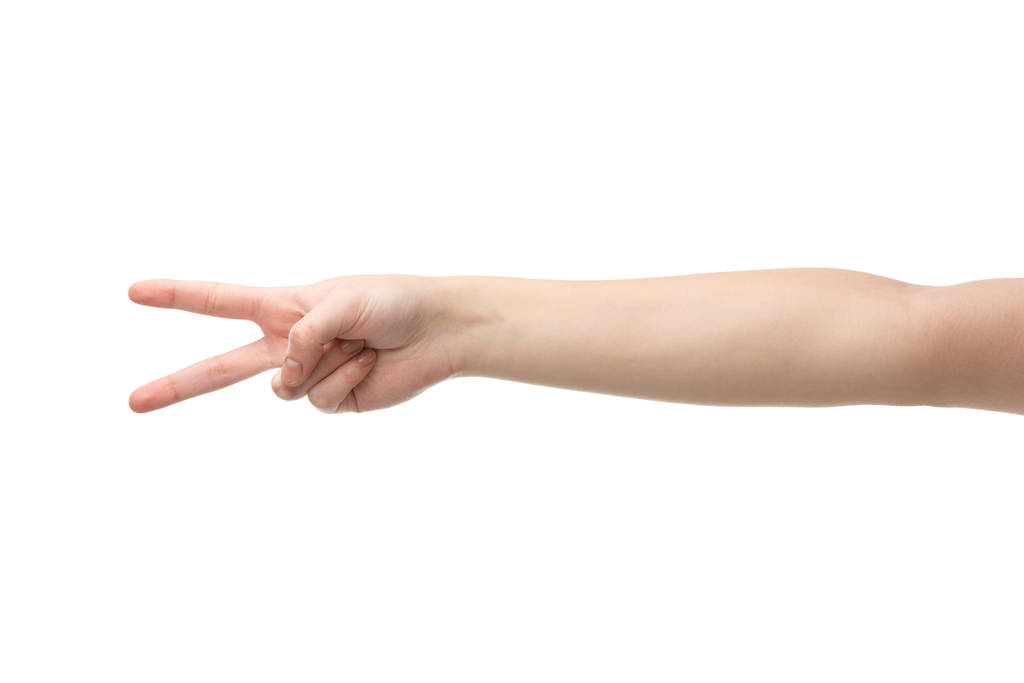 обрізаний вид жінки, що показує мирний жест ізольований на білому
 - Фото, зображення
