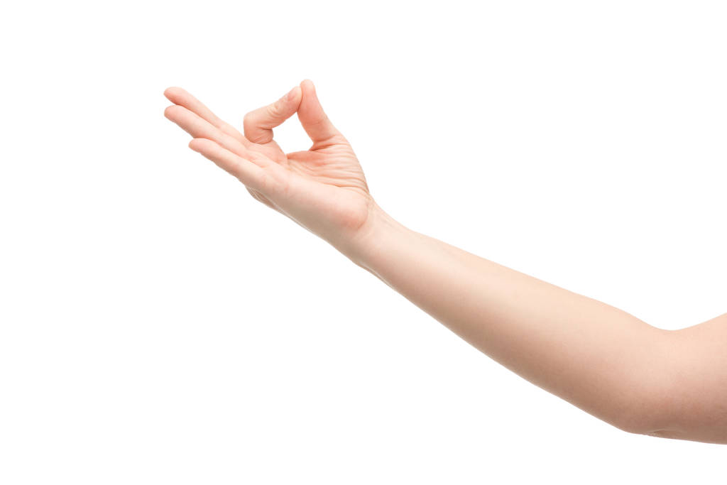 vista cortada da mulher mostrando gesto de meditação isolado no branco
 - Foto, Imagem
