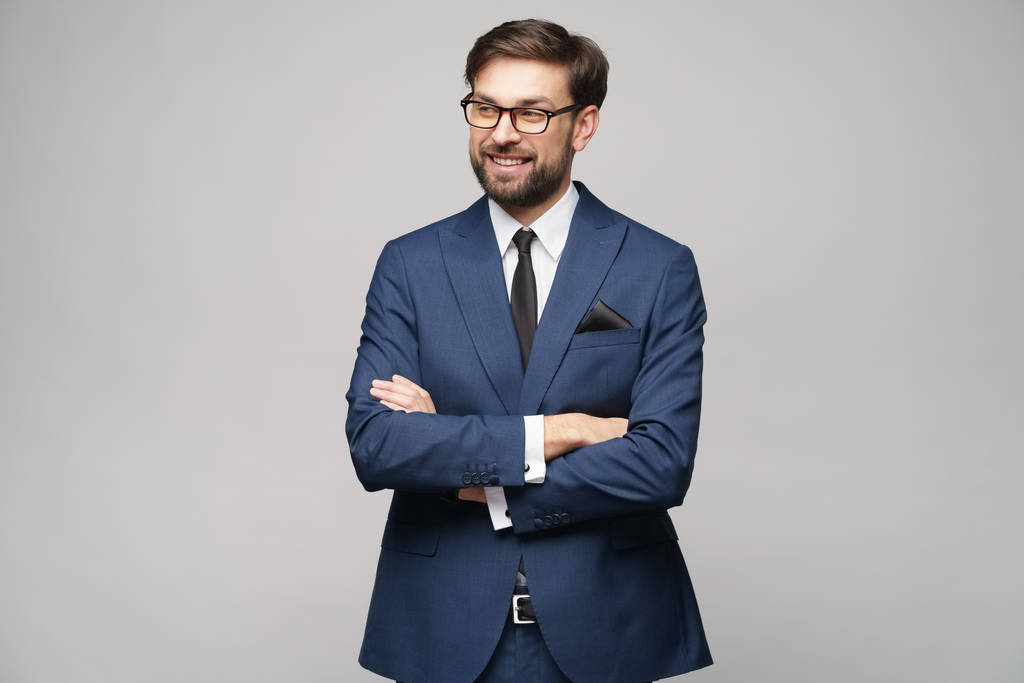 studio photo of young handsome businessman wearing suit - Photo, Image