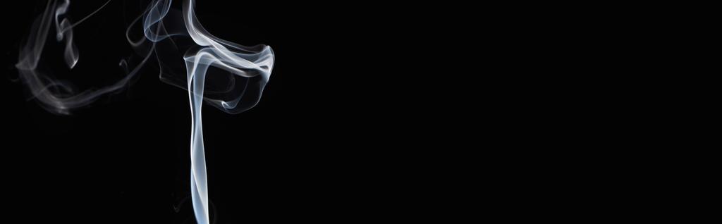 white curved smoke on black background, panoramic shot - Photo, Image