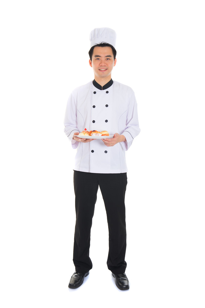 Retrato de chef varón confiado sonriendo aislado sobre fondo blanco
 - Foto, Imagen