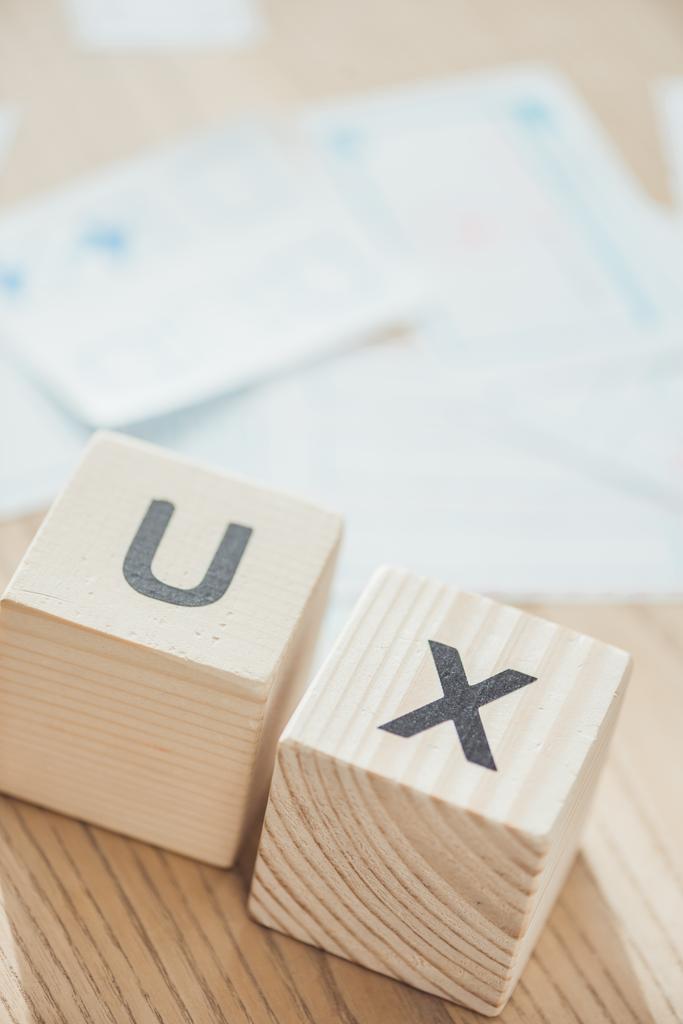 Selective focus of letters ux on wooden cubes on table - Photo, Image