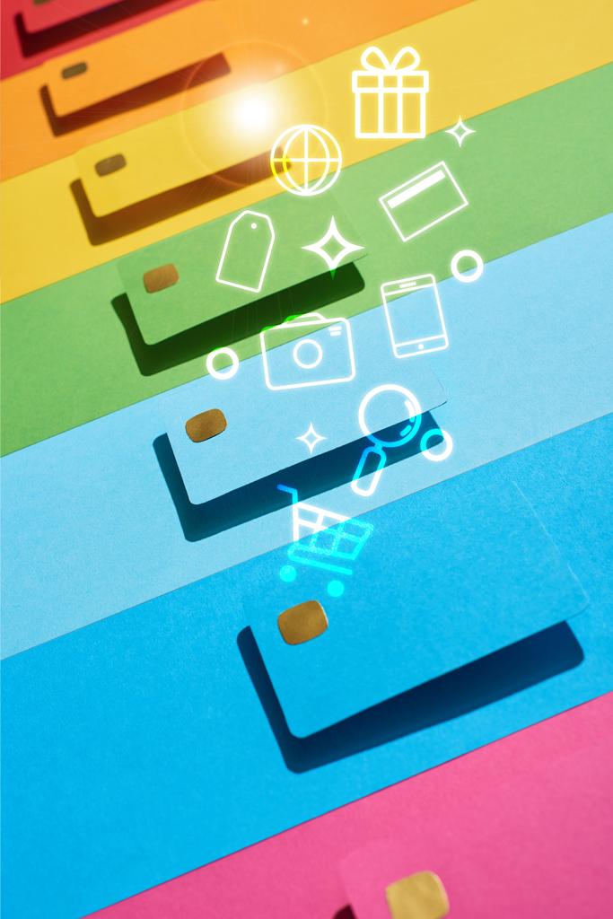 multicolored empty credit cards on rainbow background with icons illustration - Fotoğraf, Görsel