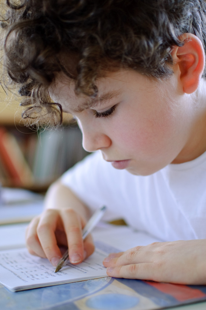 Boy doing homework - Photo, Image