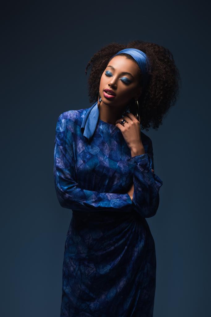 attractive african american woman with closed eyes isolated on blue - Photo, Image
