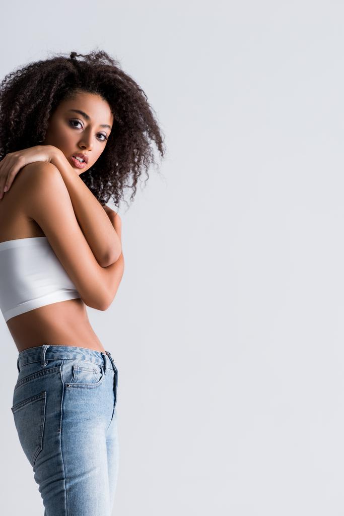 african american woman in white top isolated on grey - Photo, Image