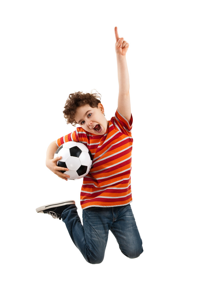 αγόρι άλμα με Ποδόσφαιρο μπάλα - Φωτογραφία, εικόνα