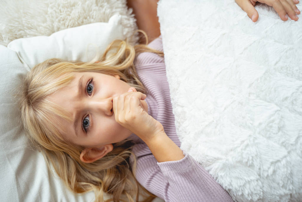 Sick child suffering from cough stock photo - Photo, Image