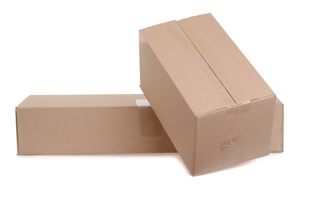 Deux boîtes en carton sur fond blanc
 - Photo, image