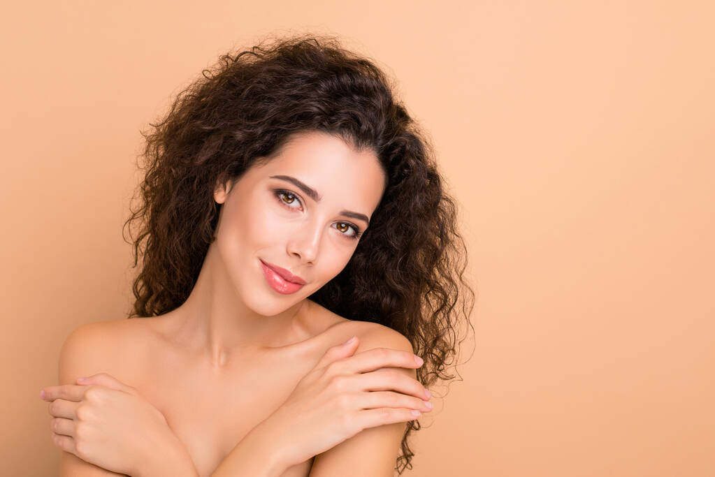 Close up photo beautiful she her lady overjoyed hands arms palms hold chest herself shoulder skin hide close cover soft silky shiny ideal healthy breast wear no clothes isolated beige background - Photo, Image