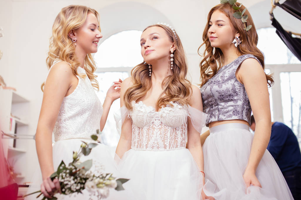 portrait of beautiful young ladies in wedding dresses - Photo, Image