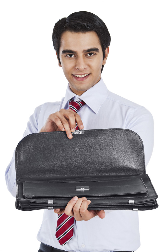 Uomo d'affari in possesso di una borsa
 - Foto, immagini