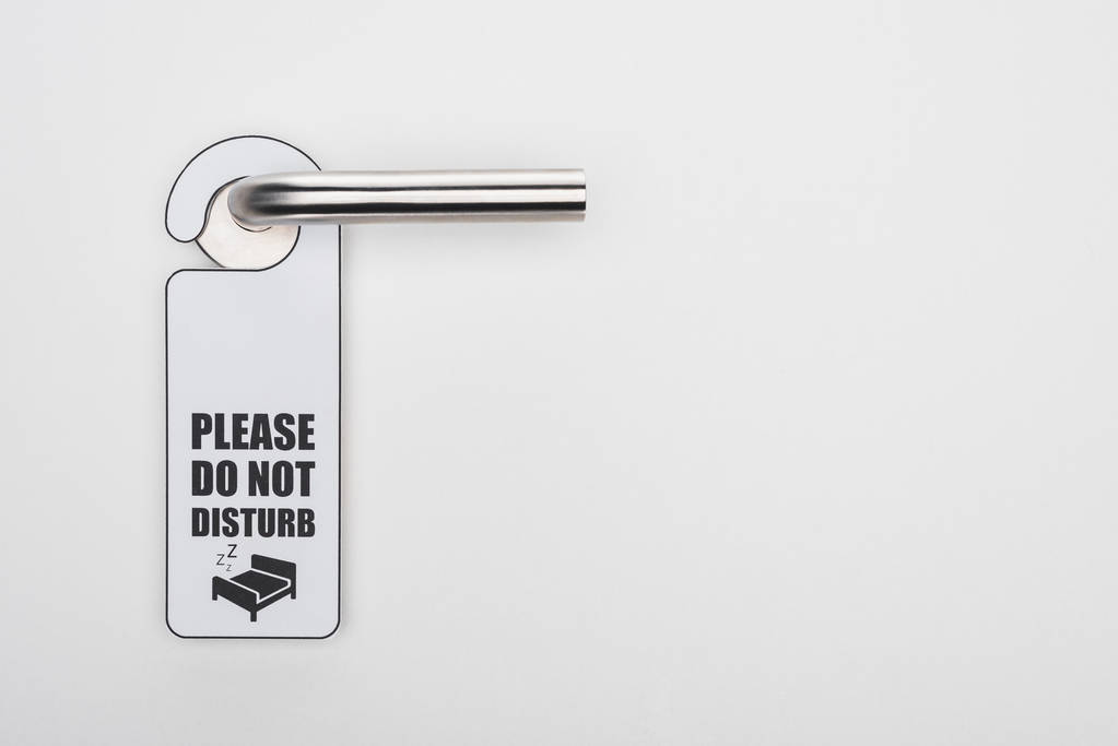 please do no disturb sign on handle on white background - Photo, Image