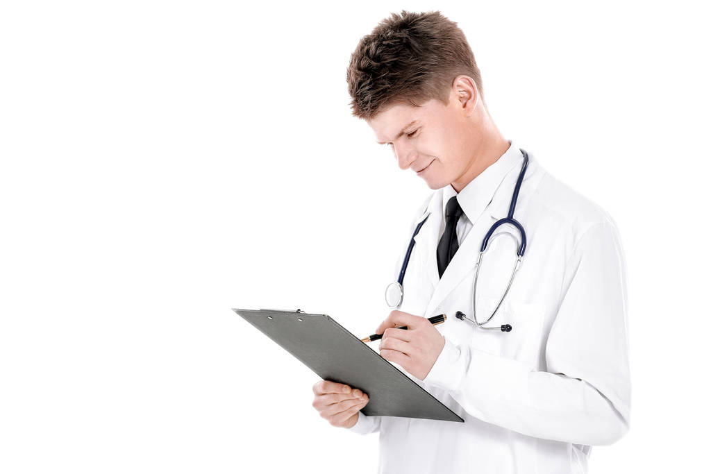 Kinderarzt mit Dokumenten. Isoliert auf weißem Hintergrund - Foto, Bild