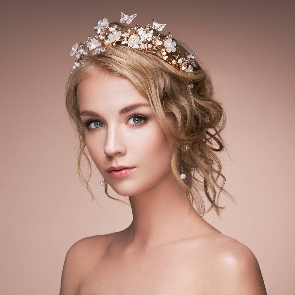 Young blonde woman with tiara on her head - Photo, Image