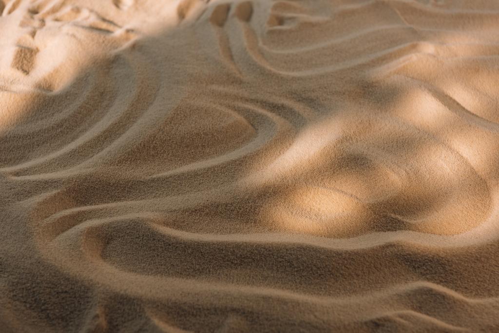 Άποψη υψηλής γωνίας υφής άμμου με ηλιακό φως - Φωτογραφία, εικόνα