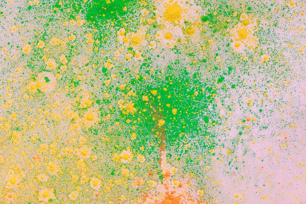 turuncu, sarı ve yeşil renkli holi boya patlaması - Fotoğraf, Görsel