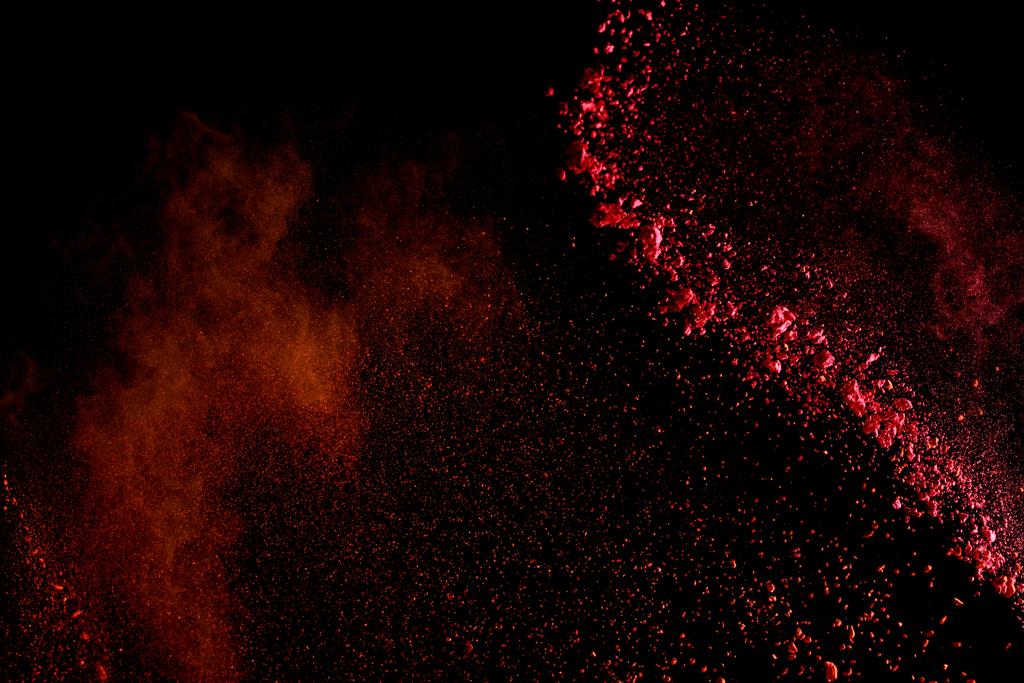 vermelho colorido holi pintura explosão no fundo preto
 - Foto, Imagem