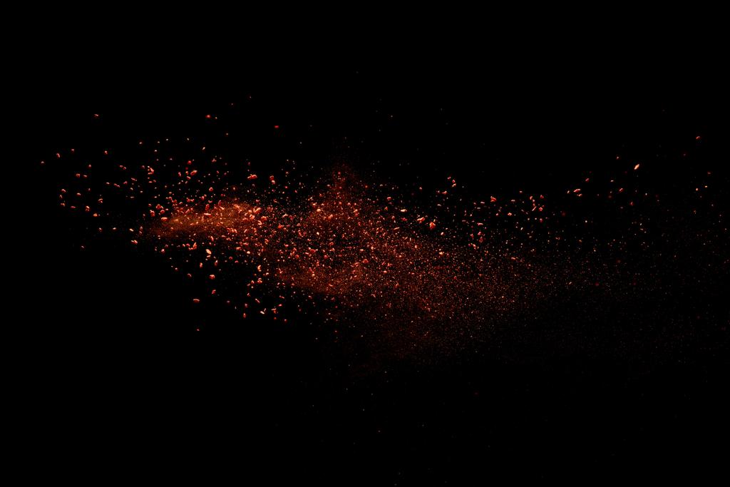 rojo colorido holi pintura explosión sobre fondo negro
 - Foto, imagen