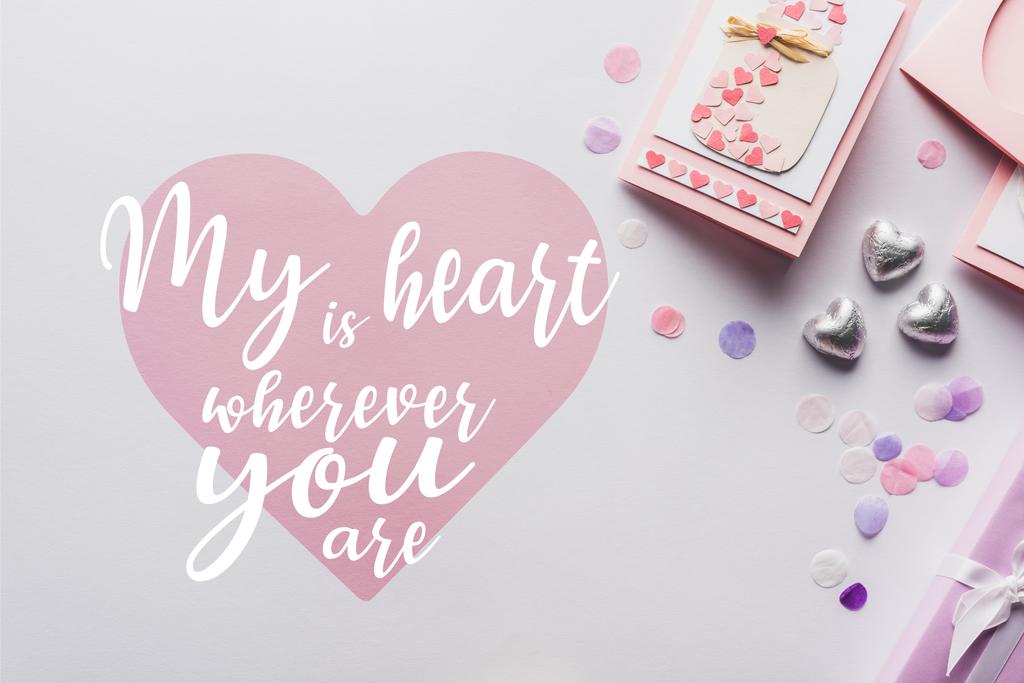 Вид сверху украшения валентинки, поздравительная открытка, сердечки, конфетти на белом фоне с моим сердцем - это когда-нибудь, когда-нибудь.
 - Фото, изображение