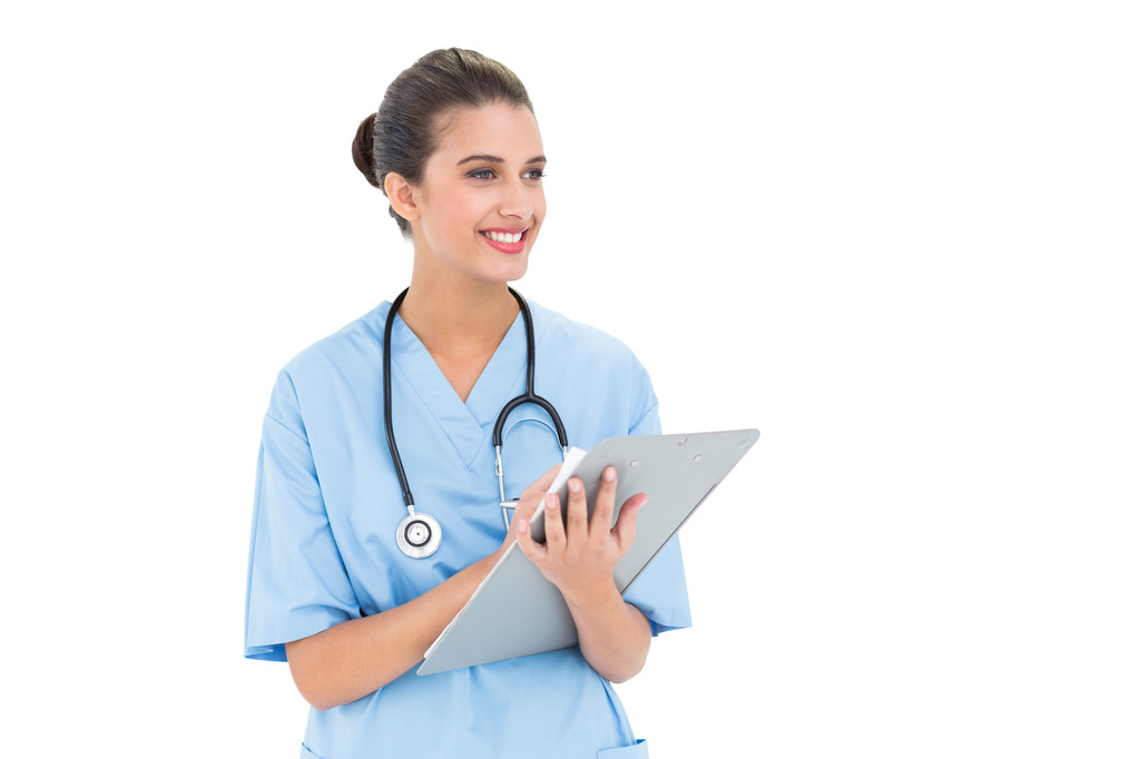Enfermeira atraente em esfoliação azul verificando um relatório
 - Foto, Imagem