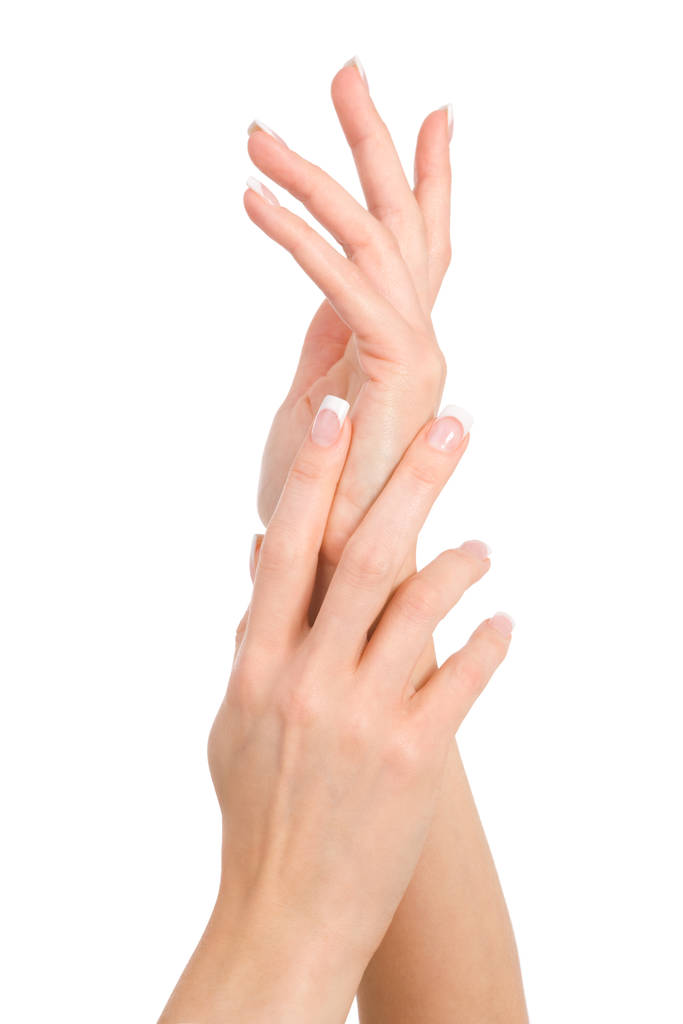 жіноча рука з французьким манікюром ізольована на білому
 - Фото, зображення