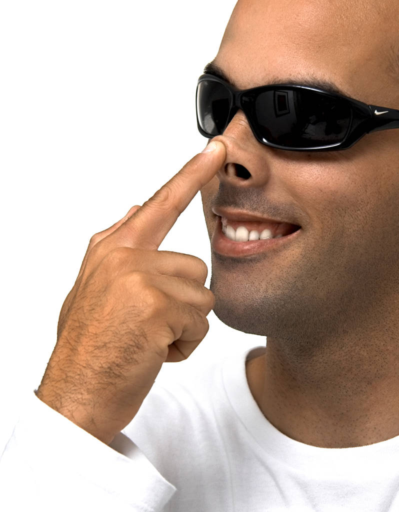Homem Toque o nariz com o dedo
 - Foto, Imagem