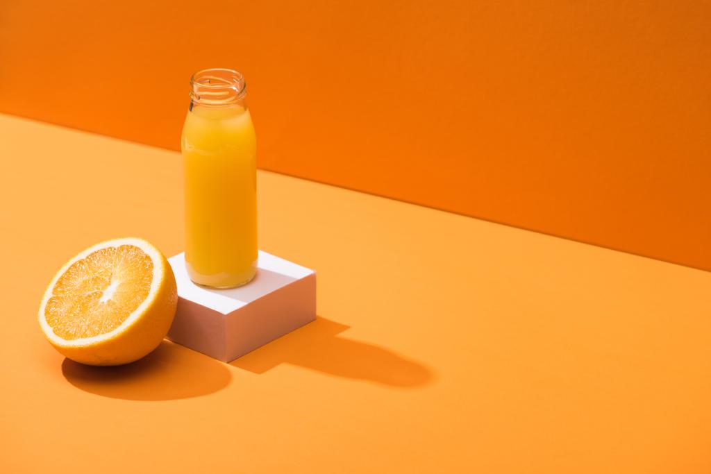 Fresh Juice In Glass Bottle Near Orange Free Stock Photo and Image