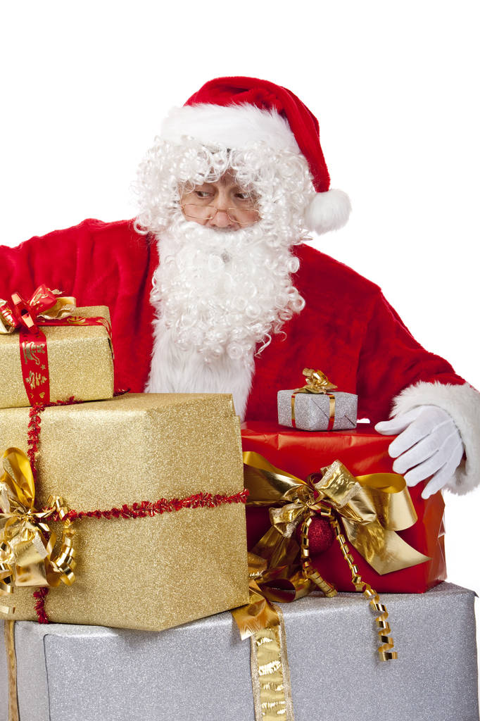 Papai Noel surpreso de joelhos com grande pilha de presente de Natal - Foto, Imagem