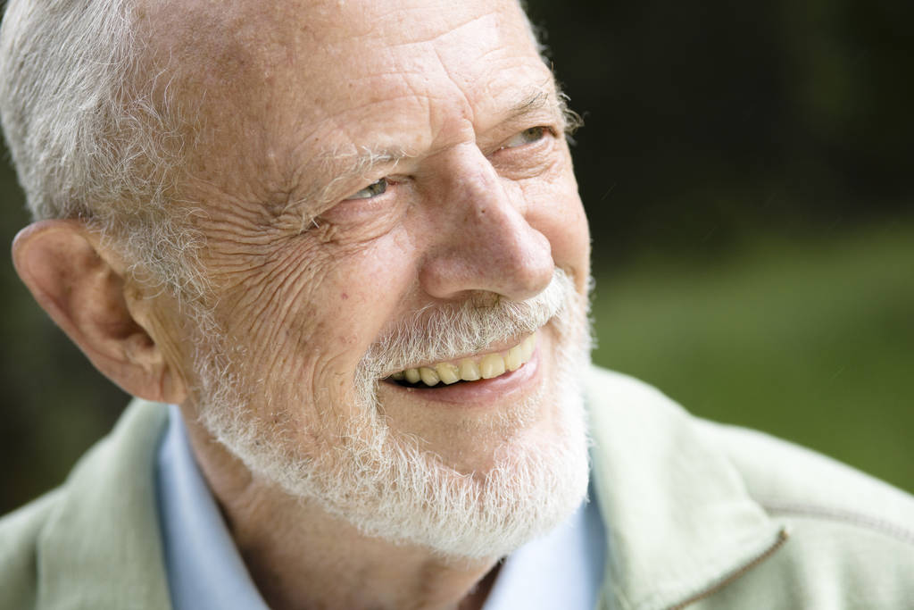 portrait of a happy senior man smiling - Photo, Image