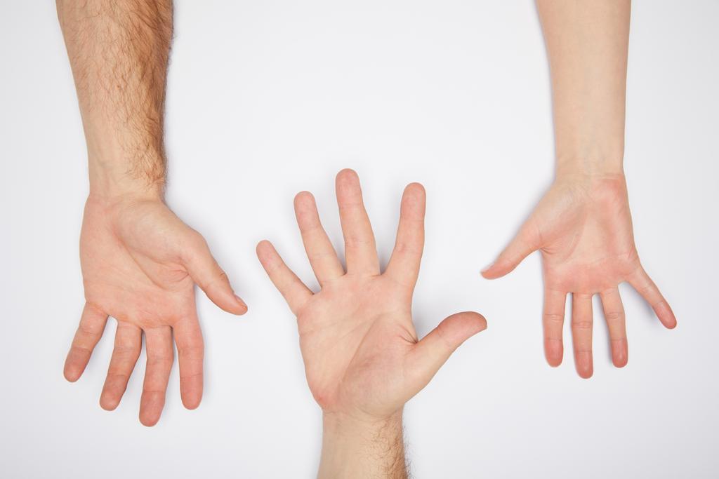 vista superior de três pessoas mostrando palmas isoladas em branco
 - Foto, Imagem