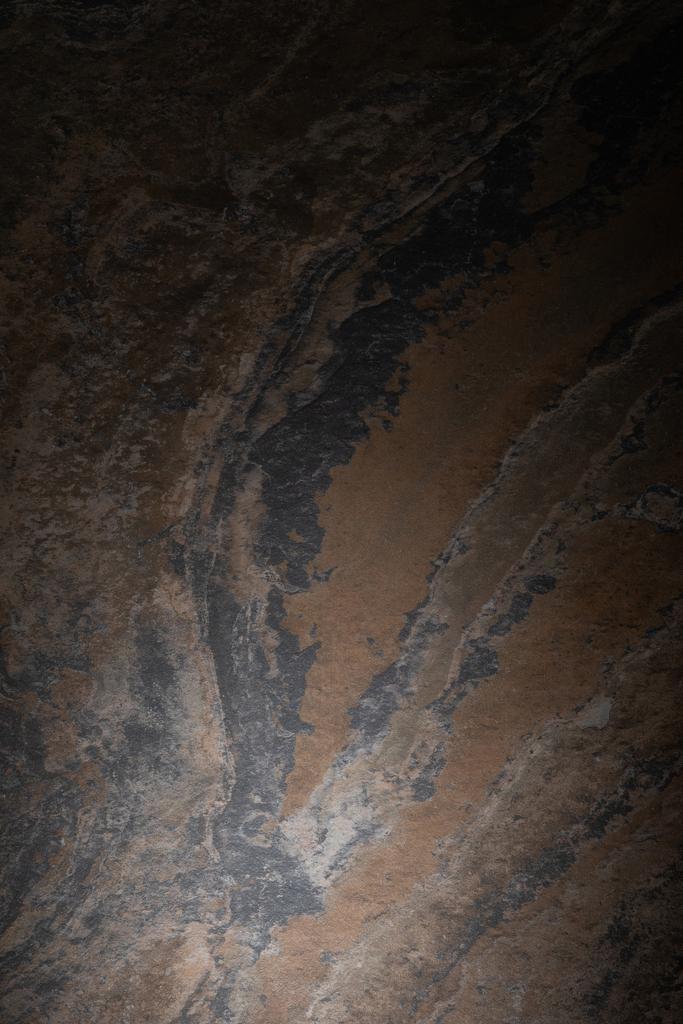 top view of textured and dark granite surface  - Photo, Image