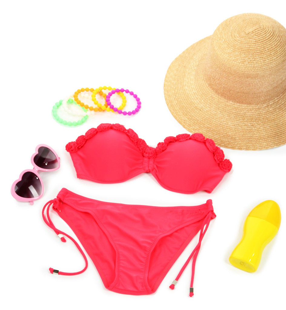 Swimsuit and beach items isolated on white - Photo, Image