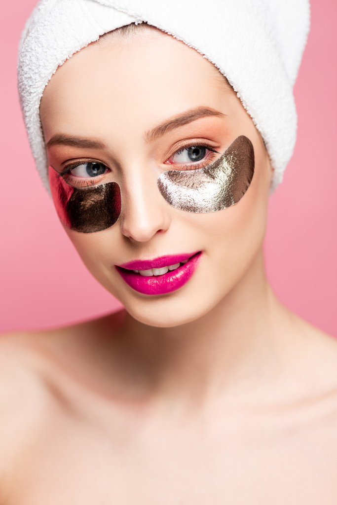 beautiful and naked woman in eye patches isolated on pink  - Fotoğraf, Görsel