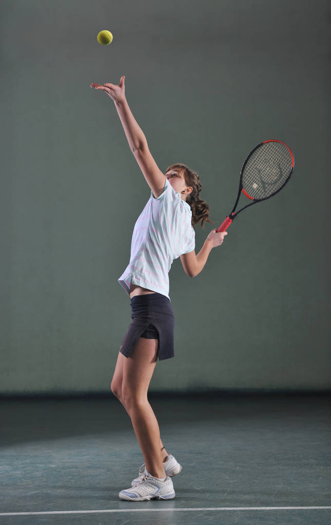 jedna žena hraje tenis sport uvnitř - Fotografie, Obrázek