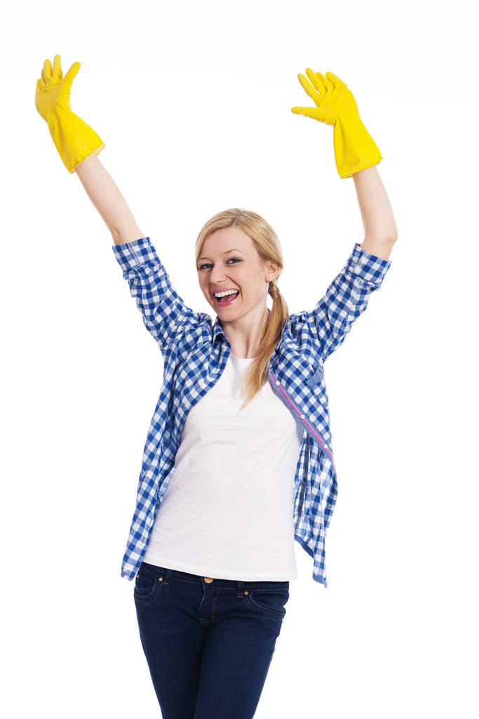 Sikeres női takarító felemelt kézzel   - Fotó, kép