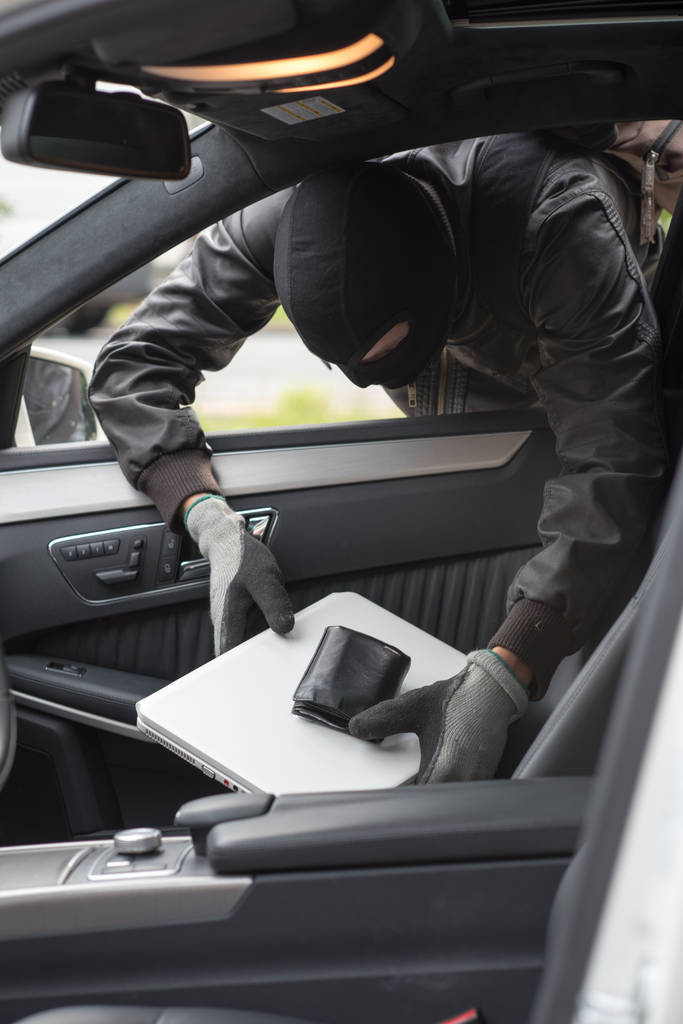 man in black gloves stealing car - Photo, Image