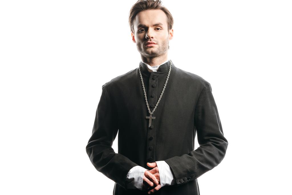 young, confident catholic priest looking at camera isolated on white - Fotoğraf, Görsel