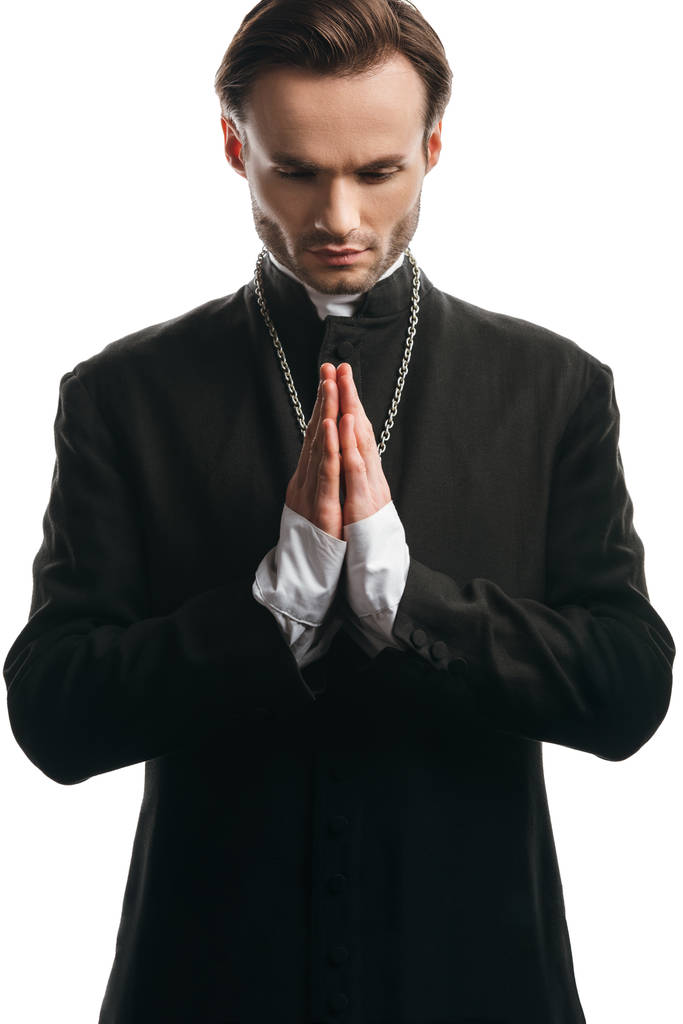 komoly katolikus pap imádkozik lehajtott fejjel elszigetelt fehér - Fotó, kép