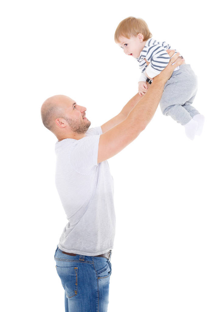 Young father and little child on a white background. Happy family. - Fotoğraf, Görsel
