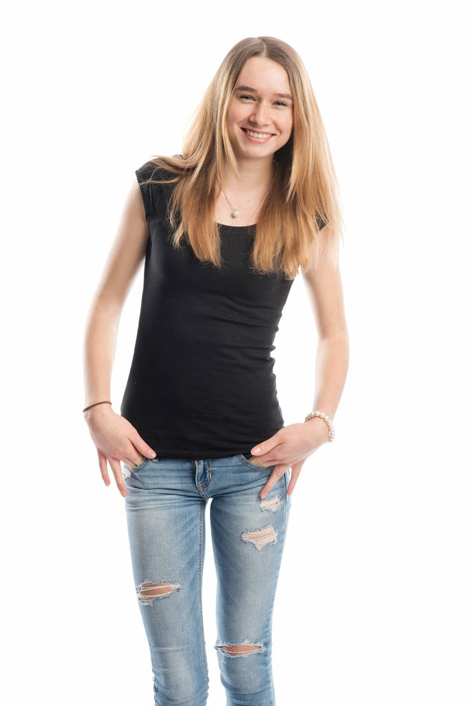 young girl in jeans smiles - Photo, Image
