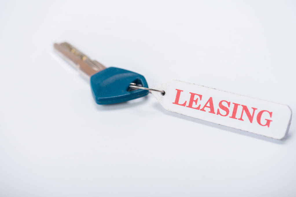 key with leasing lettering on white with copy space - Photo, Image