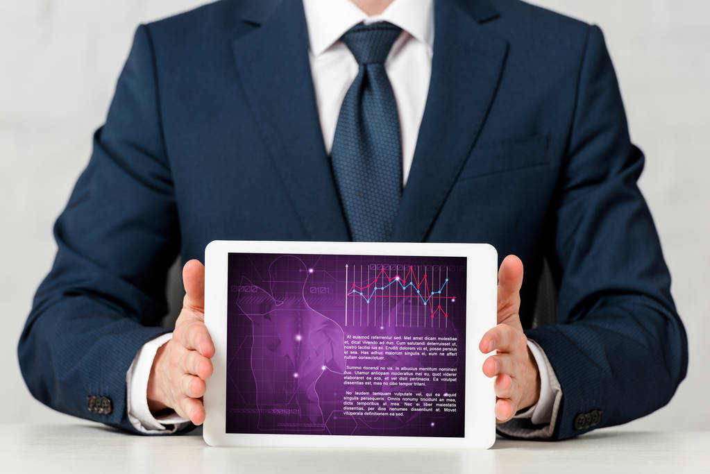 cropped view of man in suit holding digital tablet with medical app on white  - Fotoğraf, Görsel