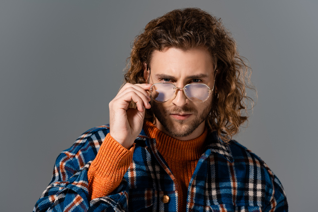 serious man in shirt and glasses looking at camera isolated on grey - Photo, Image