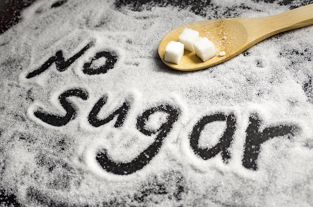 die Beschriftung von zuckerfreiem Zucker, Kariesprävention, Zahngesundheit, Ursachen kariöser Läsionen, Diabetes, Fettleibigkeit, kein Zucker - Foto, Bild